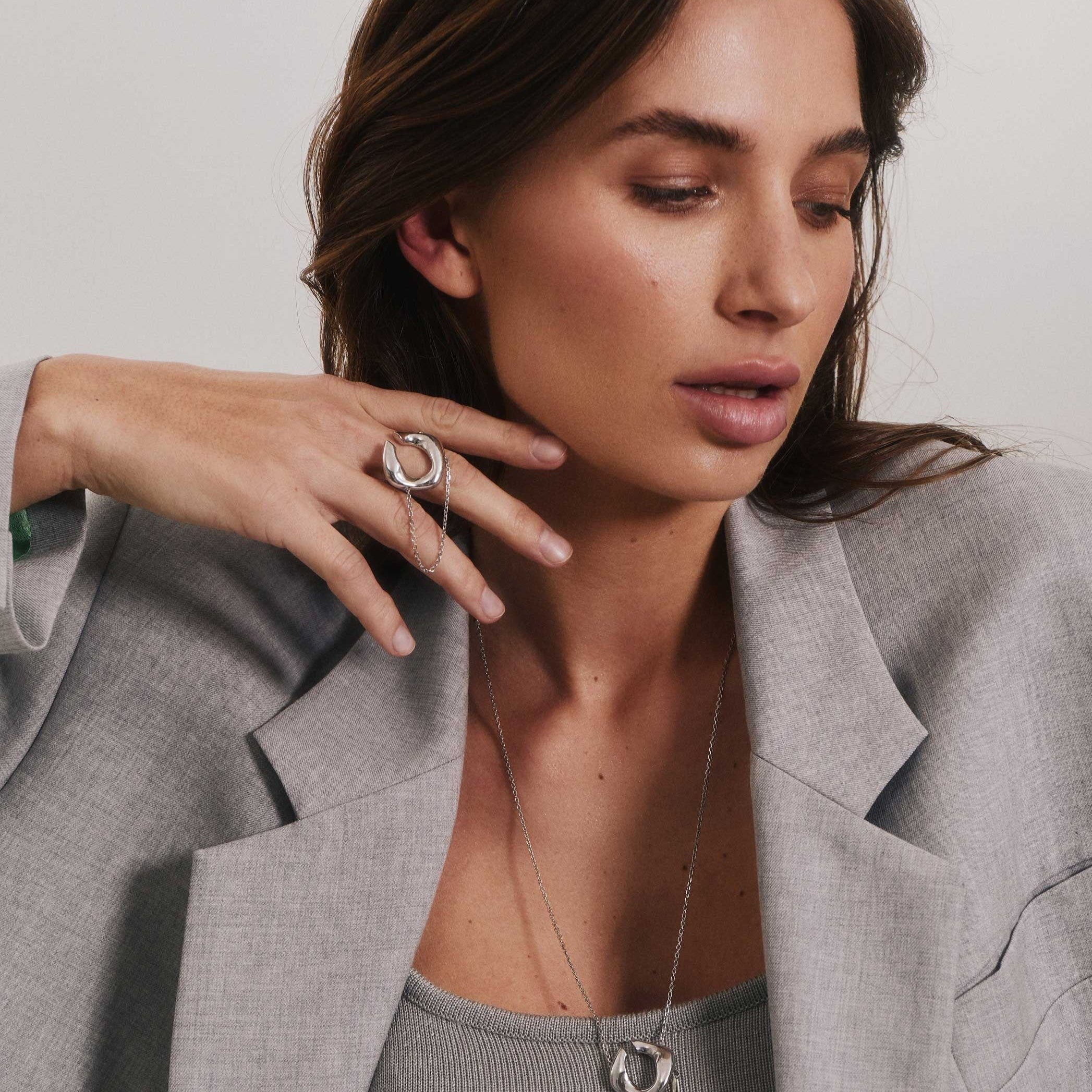 Silver set of transforming jewelry on girl