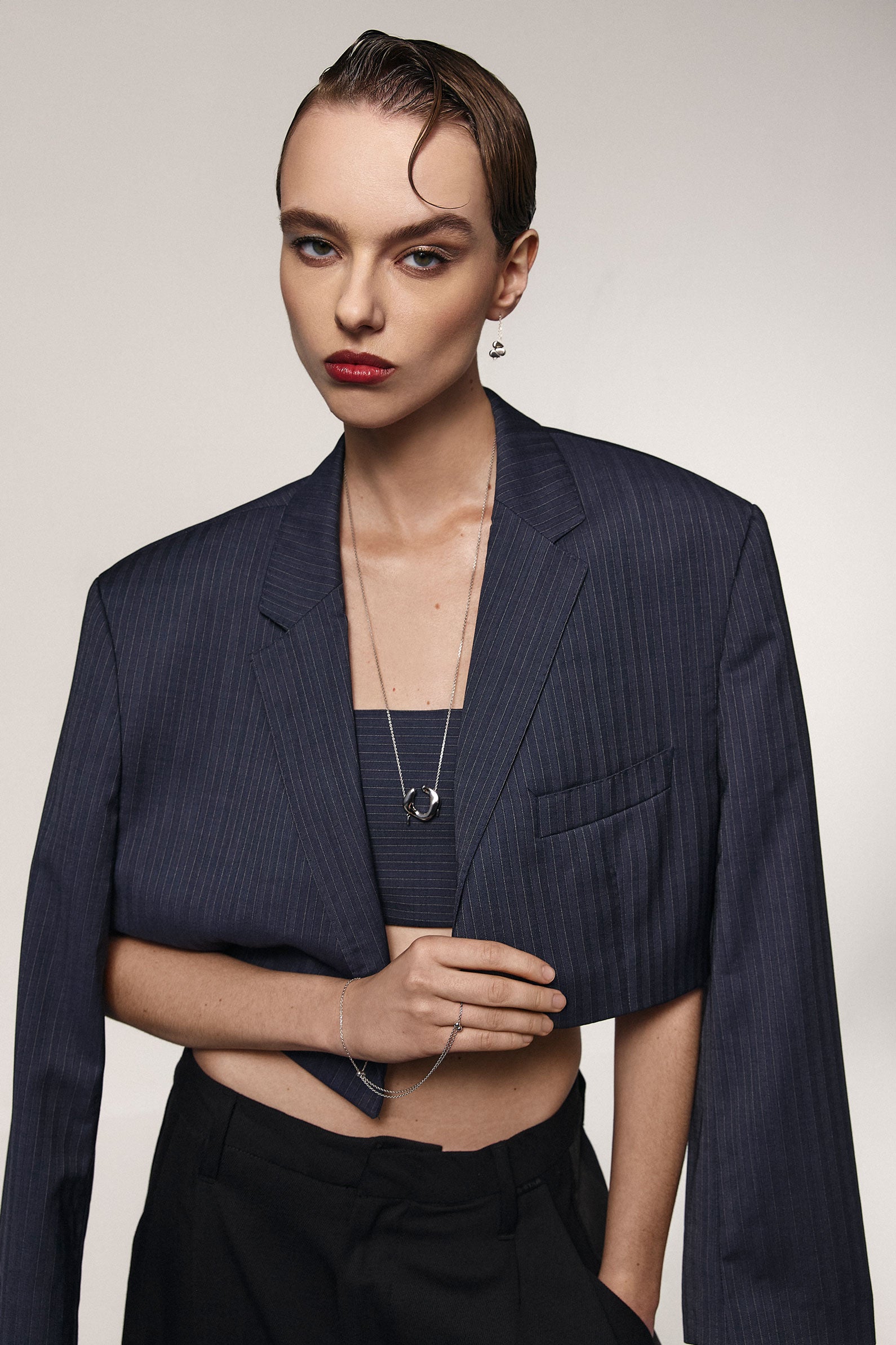 Girl in silver transforming jewelry by Orxata