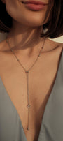 Espacio transforming necklace on the neck