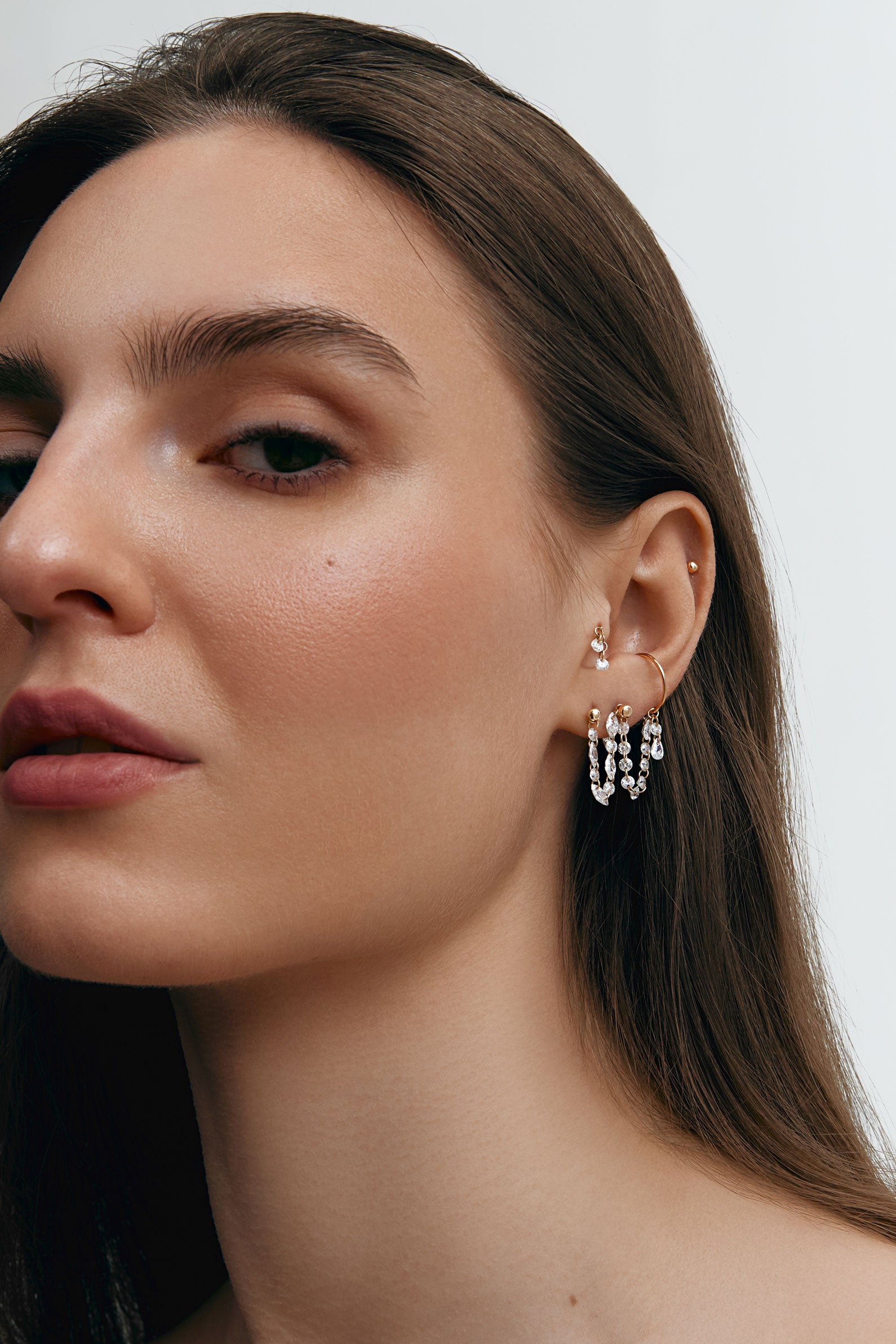 Set of modular ear jewelry with gems on the ear