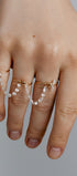 Set of three gold rings with gems connectors