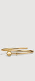 Gold open ring on a white background