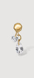 Gold earring with clear gemstones on a light gray background
