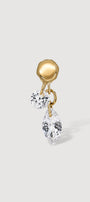 Gold earring with clear gemstones on a light gray background