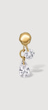Reversible gold earring with two clear gemstones 