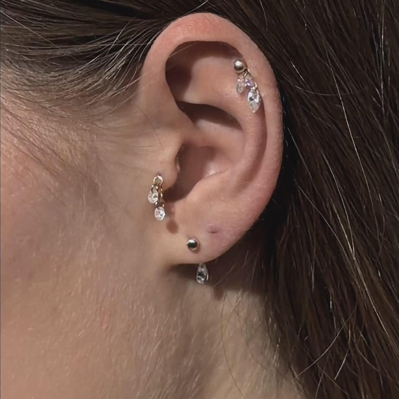 Curated ear composition with modular gems jewelry