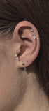 Curated ear composition with modular gems jewelry
