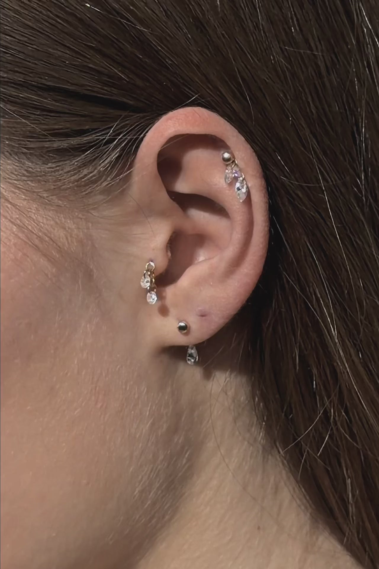 Curated ear composition with modular gems jewelry