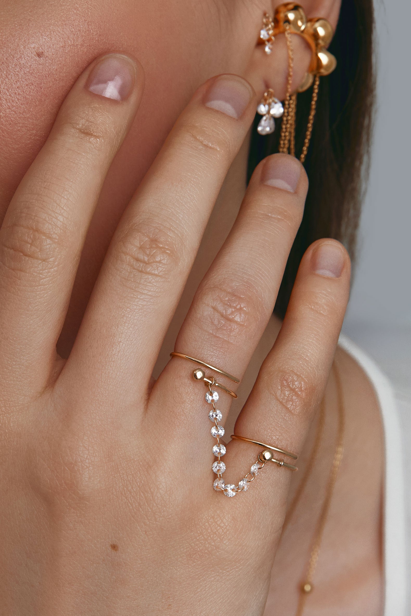 Connector with gems on the rings
