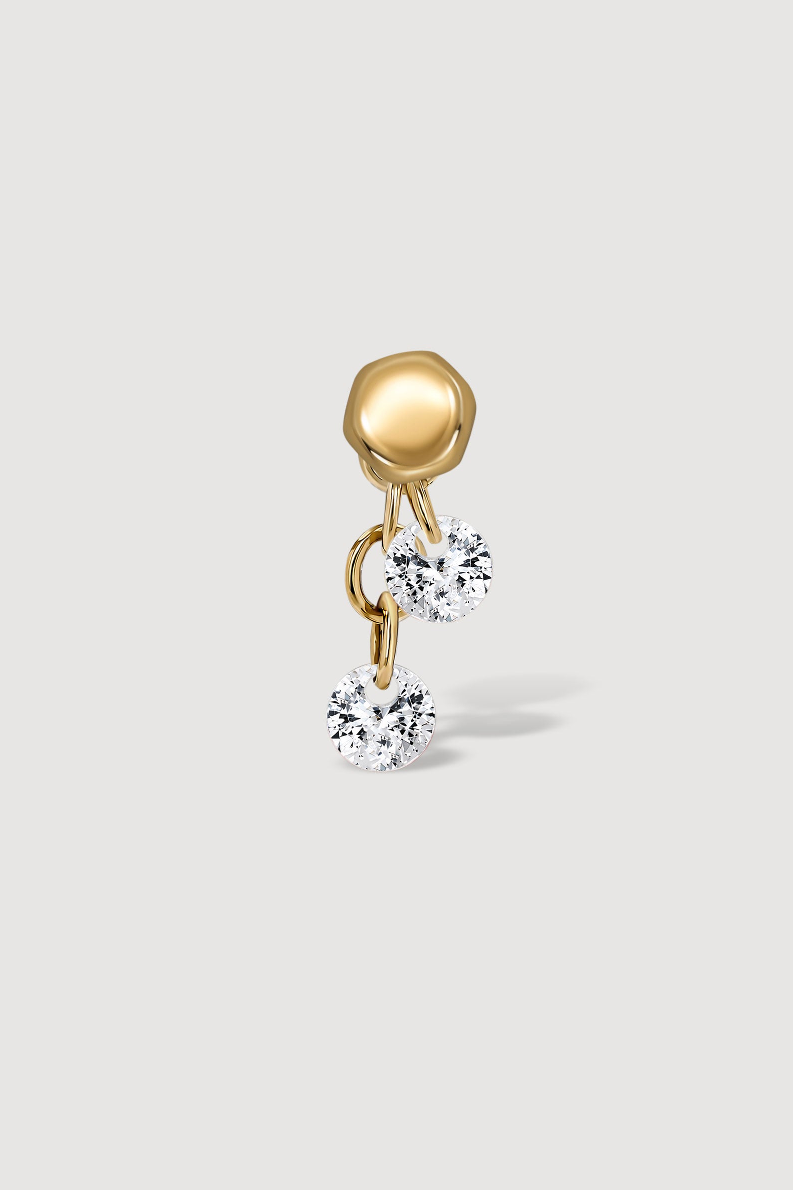 Gold reversible earring with round cut gems