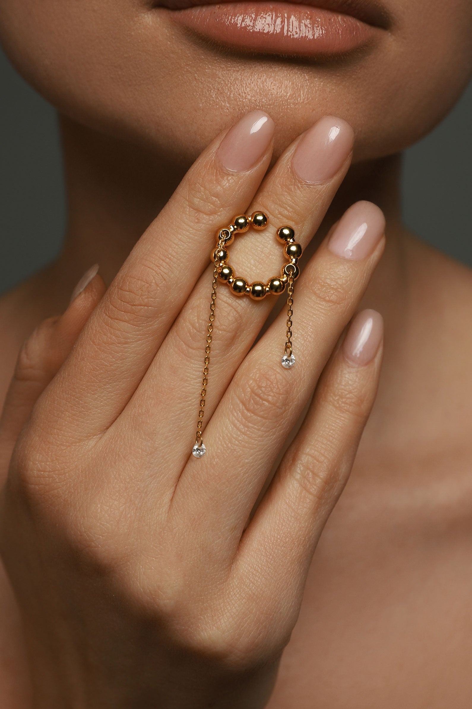 Gold midi ring with chains and gems