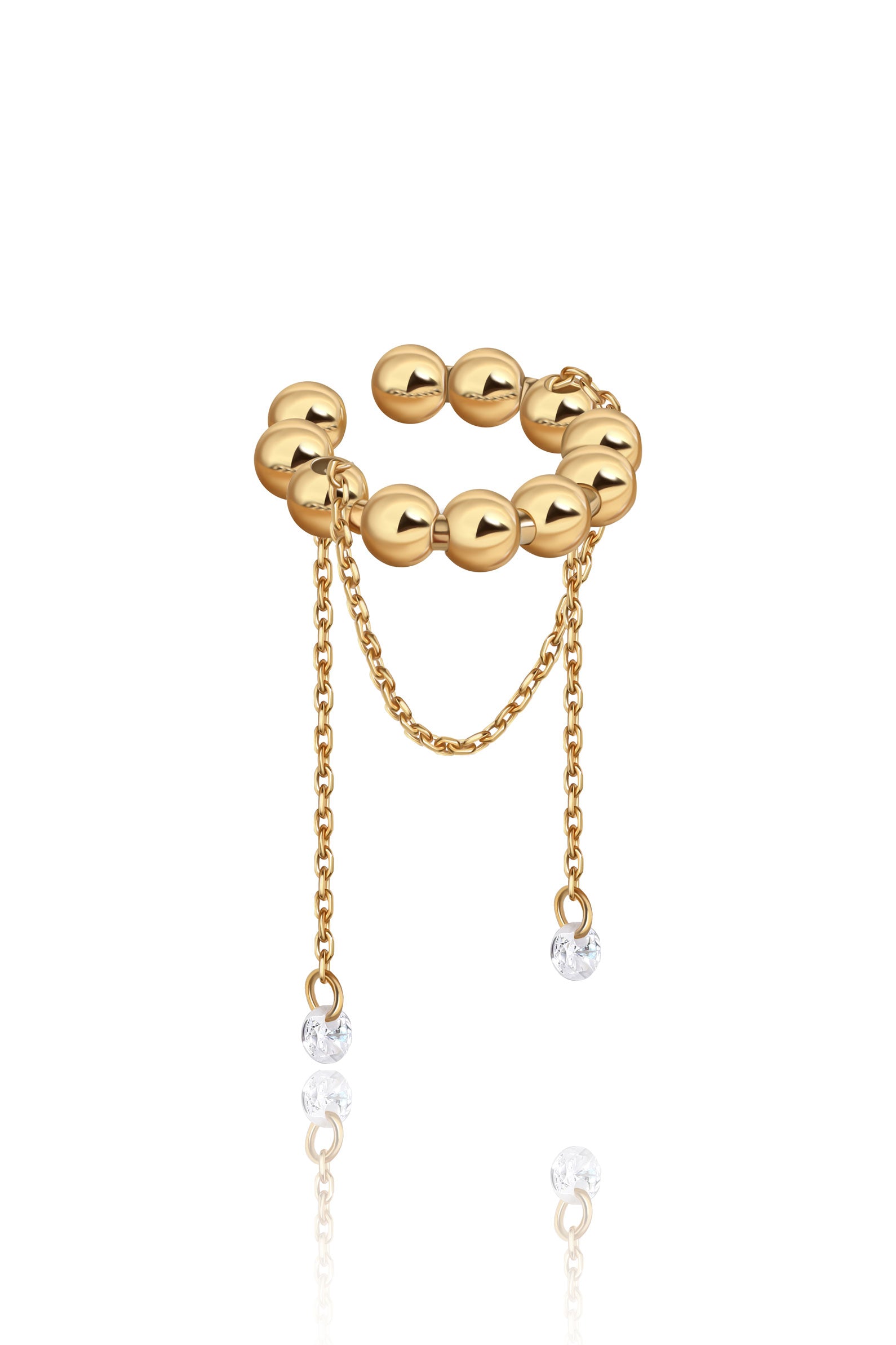 Gold beaded сгаа-ring with chain on a white background