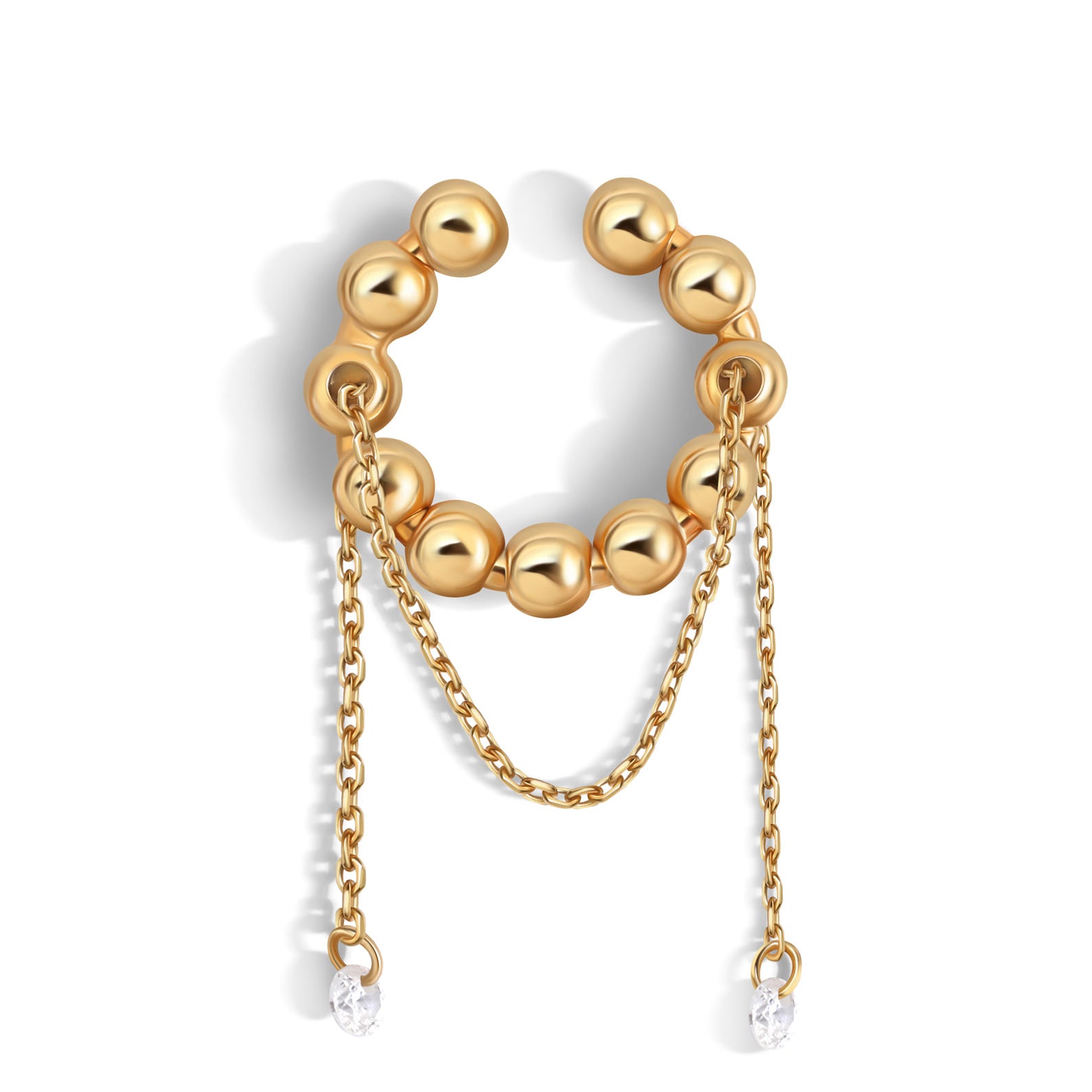 Gold ear cuff with a chain and gems on a white background